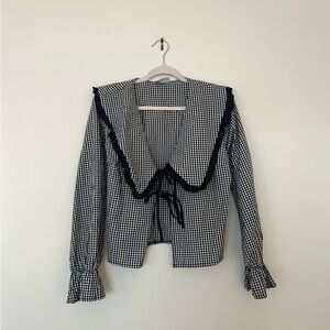 Oversized collar tie front blouse in black gingham